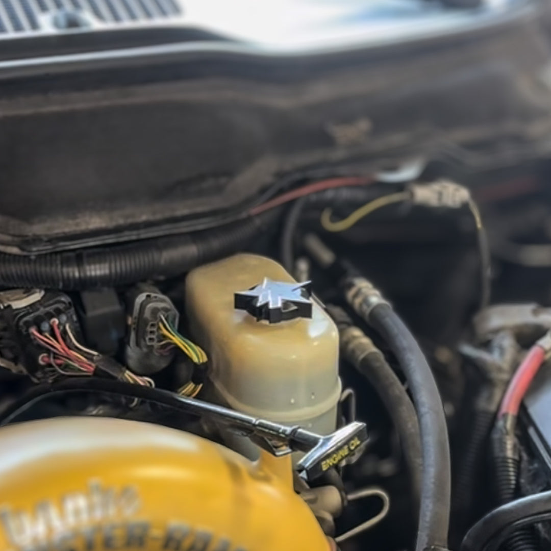 Industrial Injection Billet Brake Reservoir Cap – Black Anodized (1994–2024 RAM Cummins) - Industrial Injection