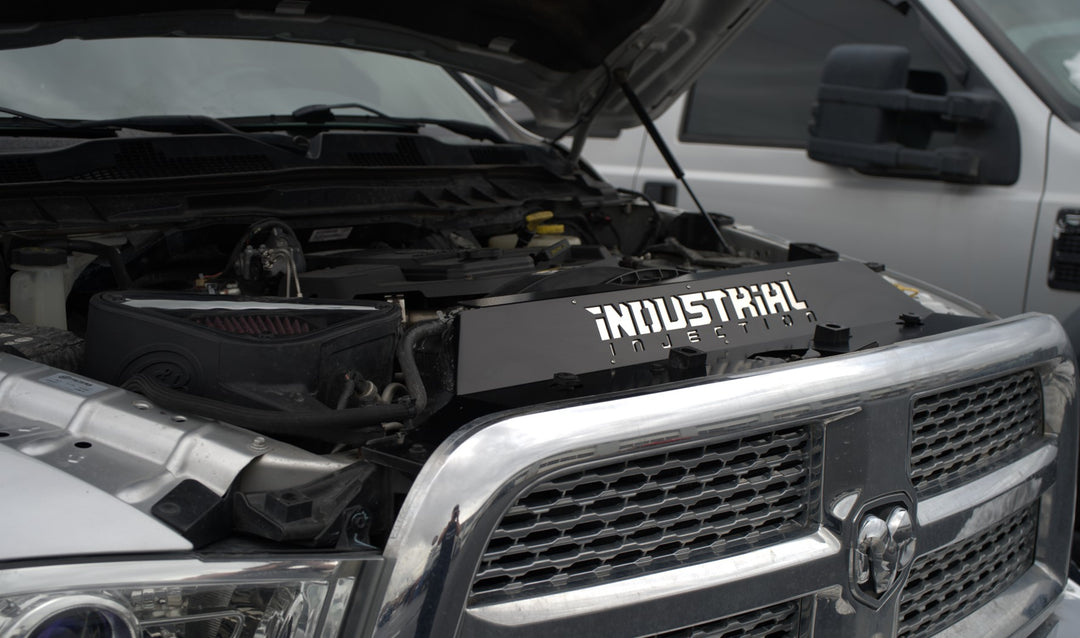 Industrial Injection radiator cover installed on 6.7L Cummins engine bay