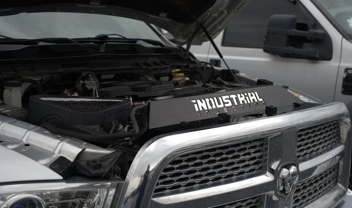 Industrial Injection radiator cover installed on 6.7L Cummins engine bay